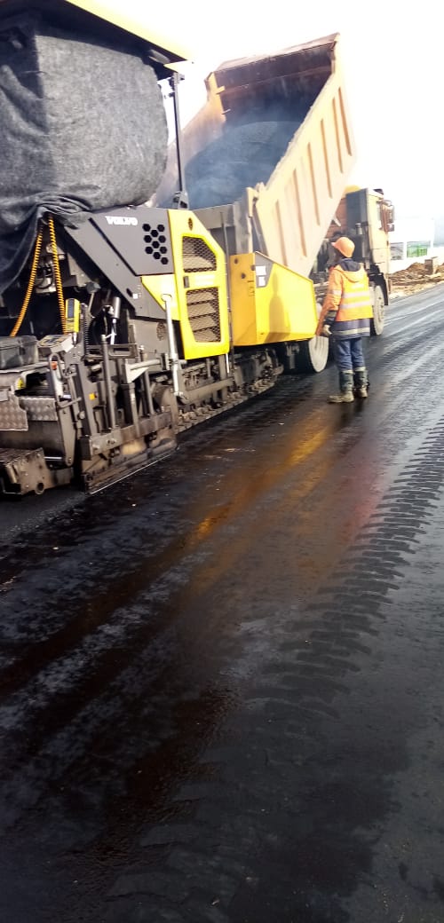 укладка асфальта асфальтоукладчиком укладка асфальта; асфальтирование; асфальтировка